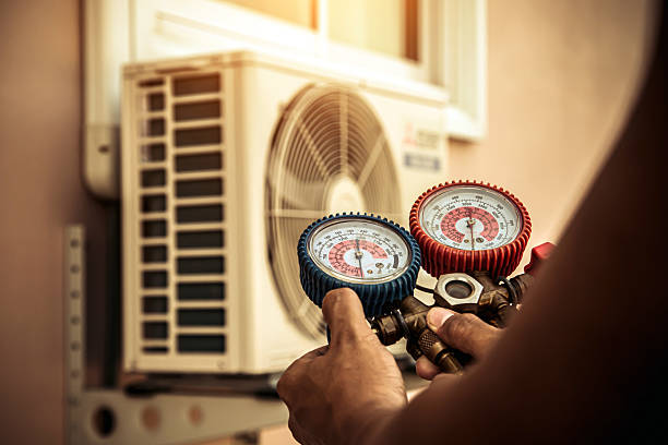 Professional Hvac technician working in Wrentham, MA